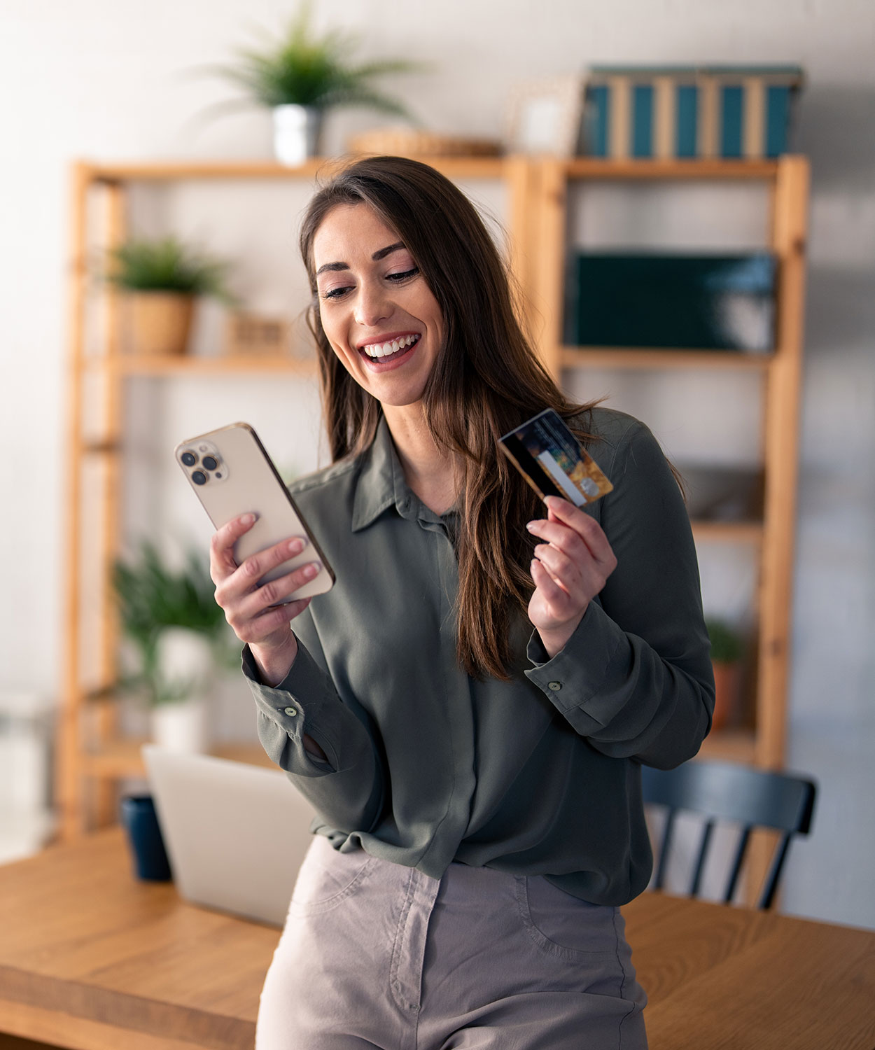 Happy woman with Credit Card